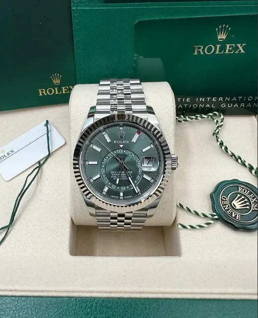 Rolex Sky-Dweller 42mm Mint Green Dial 18k White Gold Ring Command Fluted Bezel Jubilee Bracelet 336934 | Mint Condition Full Set