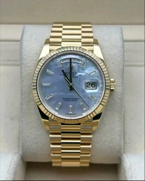 Rolex Day-Date 36mm White Mother of Pearl Diamond & Baguette Dial Fluted Bezel Solid 18k Yellow Gold President Bracelet 128238 | 2025 Mint Full Set