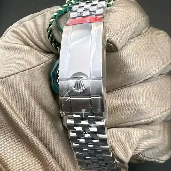 Rolex GMT-Master II "Bruce Wayne" 40mm Black Dial Black & Grey Cerachrom Bezel Green GMT Hand Jubilee Bracelet 126710GRNR | 2025 Mint Full Set - Image 4